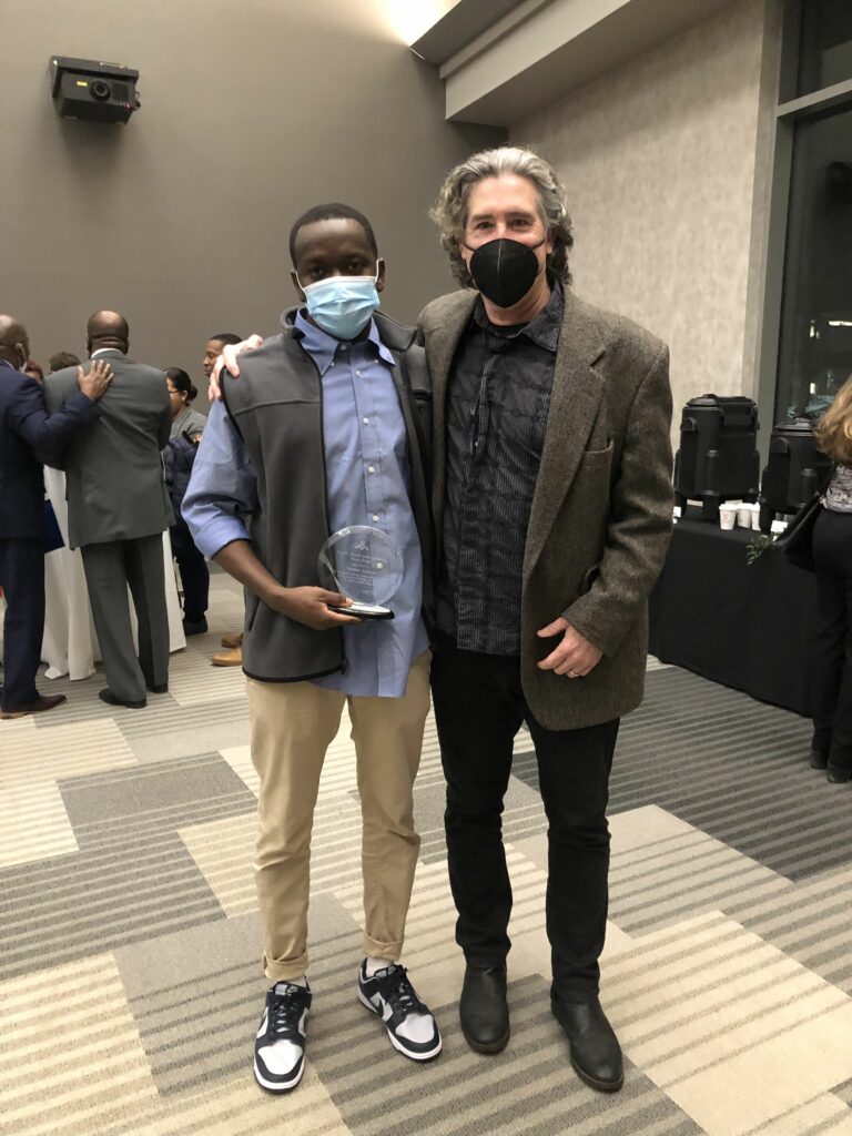 Mahfouz Soumare with DUSC Executive Director Kevin McCarthy at the 2022 MLK Vision Awards